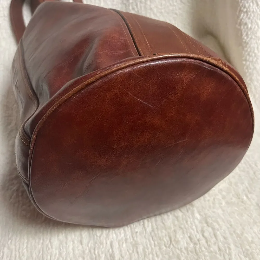 Fortune Duck vintage leather Brown sling back bucket style  bag.